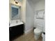Tastefully appointed powder room with modern fixtures and stylish decor at 1409 S Moody Ave # 1, Tampa, FL 33629