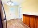 Well-lit kitchen features wood-style flooring, a refrigerator and cabinets at 2731 Union S St, St Petersburg, FL 33712