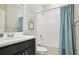 Well-lit bathroom features a shower-tub combo, vanity with sink, and neutral decor for a relaxing atmosphere at 13084 Rinella St, Venice, FL 34293