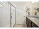 Bathroom features a glass-enclosed shower, vanity with sink, and tasteful finishes, providing a spa-like experience at 13084 Rinella St, Venice, FL 34293