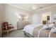 This bedroom offers a comfortable bed and furniture, complemented by soft colors and natural light for a cozy retreat at 13084 Rinella St, Venice, FL 34293