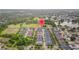 Neighborhood aerial view highlighting the community layout, landscaping, and proximity to green spaces at 11402 Peckham Pl, Tampa, FL 33625