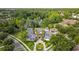 Aerial view of the community clubhouse with well-manicured lawns and verdant landscaping at 11402 Peckham Pl, Tampa, FL 33625