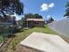 Large backyard with a patio and potential for various outdoor activities and landscaping projects at 13 Euclid Dr, Plant City, FL 33563