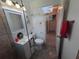 Bathroom features tiled glass shower, single vanity and new fixtures at 13 Euclid Dr, Plant City, FL 33563