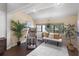 Bonus room with a massage chair, bench seating, a large window, and natural light at 4203 Fairway Run, Tampa, FL 33618