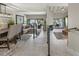 Open floor plan showcases the living and dining areas with access to the outdoor space at 4203 Fairway Run, Tampa, FL 33618