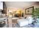 Cozy living room offers comfortable seating, a decorative rug, and a view of the adjacent dining area at 4203 Fairway Run, Tampa, FL 33618