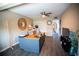 Comfortable home office features hardwood floors, an office chair, large desk, and a view of the entrance at 4203 Fairway Run, Tampa, FL 33618
