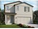 Charming two-story home featuring a covered porch, neutral siding, and an attached two-car garage at 1844 Brekey Way, Zephyrhills, FL 33541