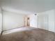 Bedroom with carpeted floors, white walls, closet and bright lighting perfect for relaxation at 1200 Tarpon Woods Blvd # L4, Palm Harbor, FL 34685