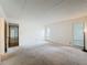 Spacious bedroom featuring carpet, natural light, and neutral walls at 1200 Tarpon Woods Blvd # L4, Palm Harbor, FL 34685
