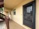 Close-up of unit 4's entrance, showcasing the access way to the front door at 1200 Tarpon Woods Blvd # L4, Palm Harbor, FL 34685