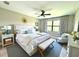 Serene main bedroom suite with stylish furnishings, a comfortable bed, and ample natural light at 2729 Gabel Oak Dr, North Port, FL 34289