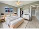 Inviting bedroom with neutral walls, a cozy bed, and a bright window view at 5629 Nutmeg Ave, Sarasota, FL 34231