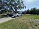 View of the property and driveway at 1009 S Clark Ave, Tampa, FL 33629