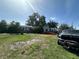 View of the property and front yard at 1009 S Clark Ave, Tampa, FL 33629