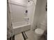 A clean bathroom including a tub and a toilet at 13707 Newbridge St, Spring Hill, FL 34609