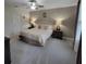 Cozy bedroom featuring soft carpet, neutral decor, and bedside lamps, creating a warm and inviting space at 13707 Newbridge St, Spring Hill, FL 34609