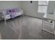 Bedroom featuring a daybed and white walls at 13707 Newbridge St, Spring Hill, FL 34609