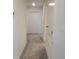 Hallway featuring neutral paint and carpet at 13707 Newbridge St, Spring Hill, FL 34609