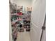 A pantry with adjustable metal shelving full of storage items at 13707 Newbridge St, Spring Hill, FL 34609