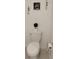 Bright powder room featuring a toilet with decorative art at 13707 Newbridge St, Spring Hill, FL 34609