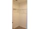 A large walk-in closet with a carpeted floor and shelving at 13707 Newbridge St, Spring Hill, FL 34609
