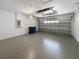 Spacious two-car garage with plenty of storage space and an automatic door at 16006 Stags Leap Dr, Lutz, FL 33559