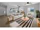 Bright living room with neutral walls, stylish furniture, and large windows for natural light at 16006 Stags Leap Dr, Lutz, FL 33559
