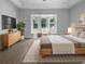 Spacious main bedroom with a bay window seating area, natural light, and neutral tones at 16006 Stags Leap Dr, Lutz, FL 33559