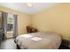 Bedroom with wood floors, neutral walls, and ample natural light at 1716 Westerly Dr, Brandon, FL 33511
