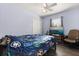 Bedroom with a large window, ceiling fan, and hardwood floors at 1716 Westerly Dr, Brandon, FL 33511