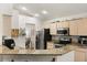 Kitchen with granite countertops and stainless steel appliances at 1716 Westerly Dr, Brandon, FL 33511