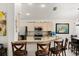 Open kitchen with granite countertops and bar stool seating at 1716 Westerly Dr, Brandon, FL 33511