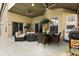 A covered patio with ceiling fans and comfortable seating area, perfect for outdoor relaxation at 1716 Westerly Dr, Brandon, FL 33511