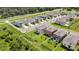 Aerial view of the residences in a manicured neighborhood at 9937 Aqua Miles Path, Wesley Chapel, FL 33545