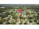 Aerial view of the property and the surrounding lakeside community at 17032 Winners Cir, Odessa, FL 33556