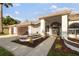 Charming exterior with a well-maintained yard, walkway to arched front door and two-car garage at 17032 Winners Cir, Odessa, FL 33556