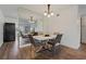 The dining room features a sleek table with six chairs and a mirror wall at 2257 World Parkway W Blvd # 61, Clearwater, FL 33763
