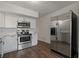 Updated kitchen features white cabinetry and stainless steel appliances at 2257 World Parkway W Blvd # 61, Clearwater, FL 33763