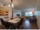 Open floor plan of living room and dining room with wood floors at 2257 World Parkway W Blvd # 61, Clearwater, FL 33763