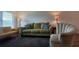 Inviting living room with plush seating, lamps, and a cozy rug, perfect for relaxation and entertaining at 2257 World Parkway W Blvd # 61, Clearwater, FL 33763