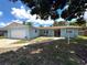 Charming single-story home with an attached garage and well-maintained front yard at 2813 21St W Ave, Bradenton, FL 34205