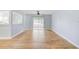 Living room with wood-look floors, ceiling fan, and natural light at 2813 21St W Ave, Bradenton, FL 34205