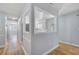Living room with wood-look floors and great views into the kitchen at 2813 21St W Ave, Bradenton, FL 34205