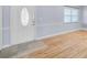 Inviting living room featuring stylish wood-look flooring and modern details at 2813 21St W Ave, Bradenton, FL 34205