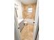 Modern bathroom is designed with stone tile, a tub and a new sink vanity at 530 74Th N Ave, St Petersburg, FL 33702