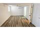 This bedroom features wood flooring, a closet, and an air conditioner at 530 74Th N Ave, St Petersburg, FL 33702