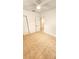 The bedroom features neutral tile flooring and a ceiling fan, offering a simple and comfortable space at 530 74Th N Ave, St Petersburg, FL 33702